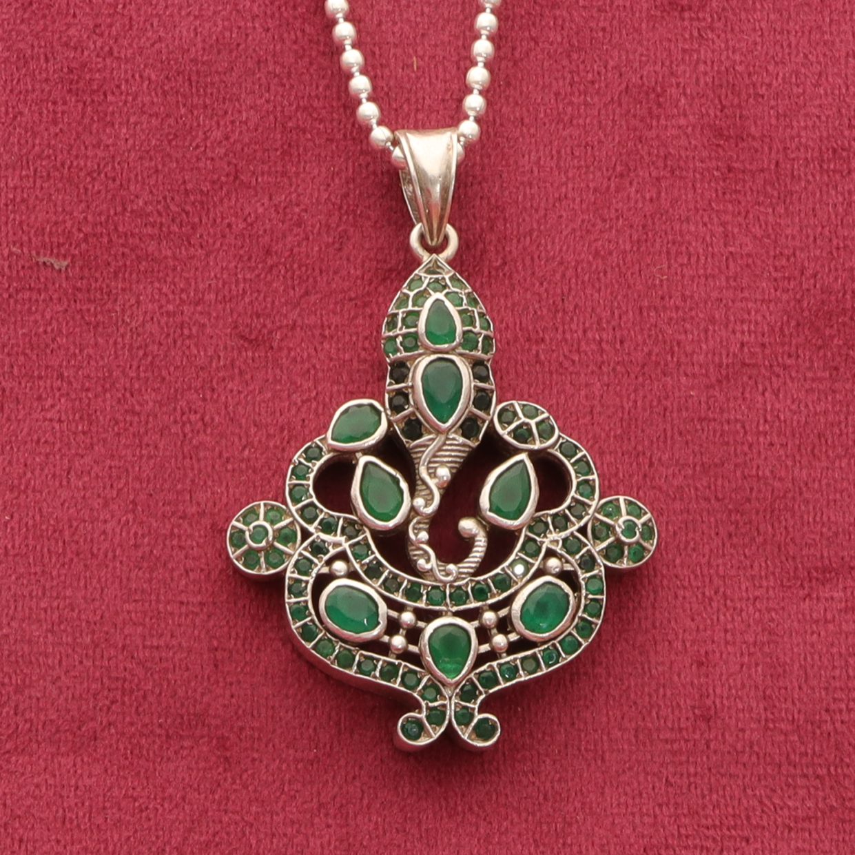 Silver Antique Green Stone studded Ganesha Pendant